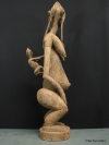 Dogon female/child on back 41 ins / 114 cms tall x 13 ins tall / 33 cms front to back----- 12 kilo
